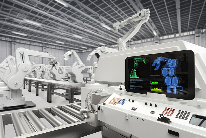© phonlamaiphoto - Fotolia.com Lots of white production robots. A silver treadmill at the middle of the picture