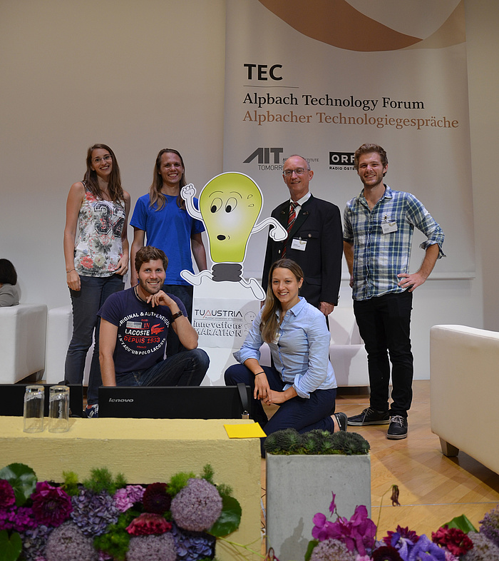 © TU Austria The five students of Team AVL with company representative at the final presentation.