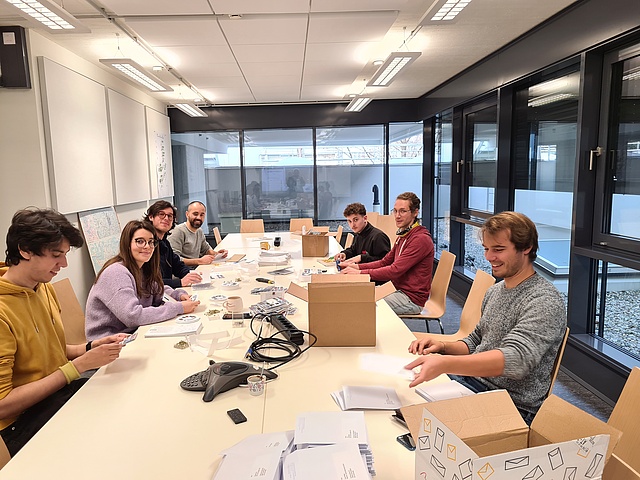 The members of the institute prepare the Christmas cards 2022 for sending :-)