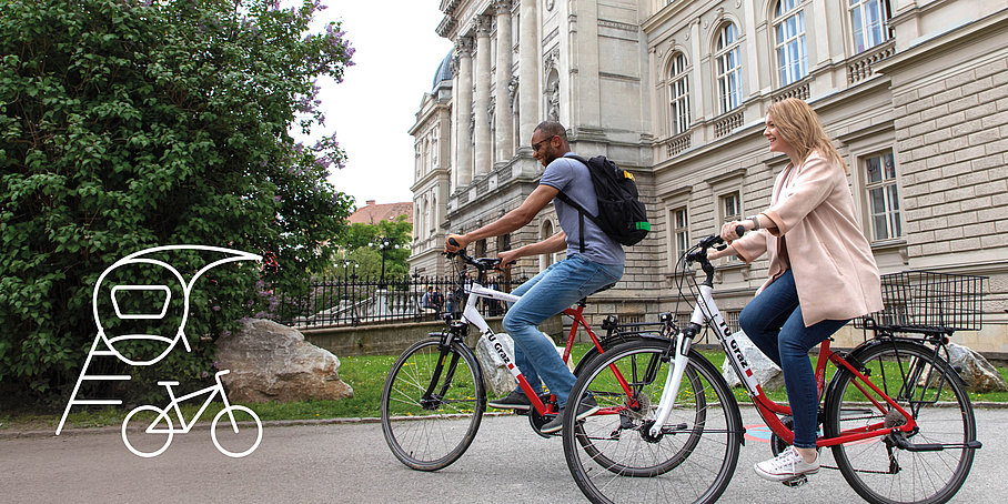 2 people on TU Graz bikes