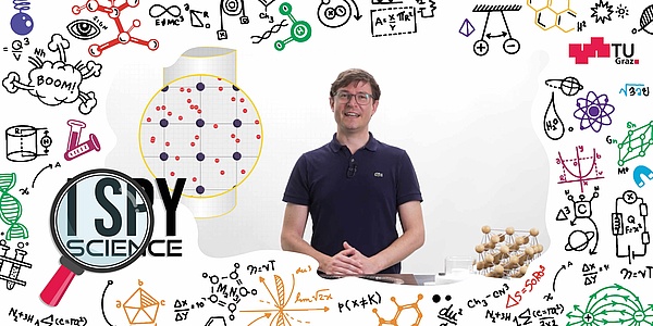 A man standing next to a table