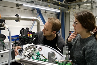Patrick Jagerhofer and Ena Badzek perform the last pre-test checkups before the IDOMINEO test facility goes into operation