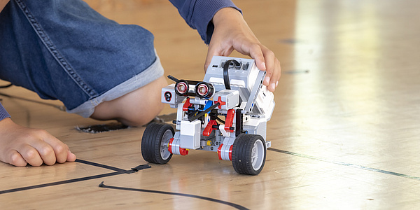 A small robot on the ground