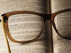 glasses on a legal text