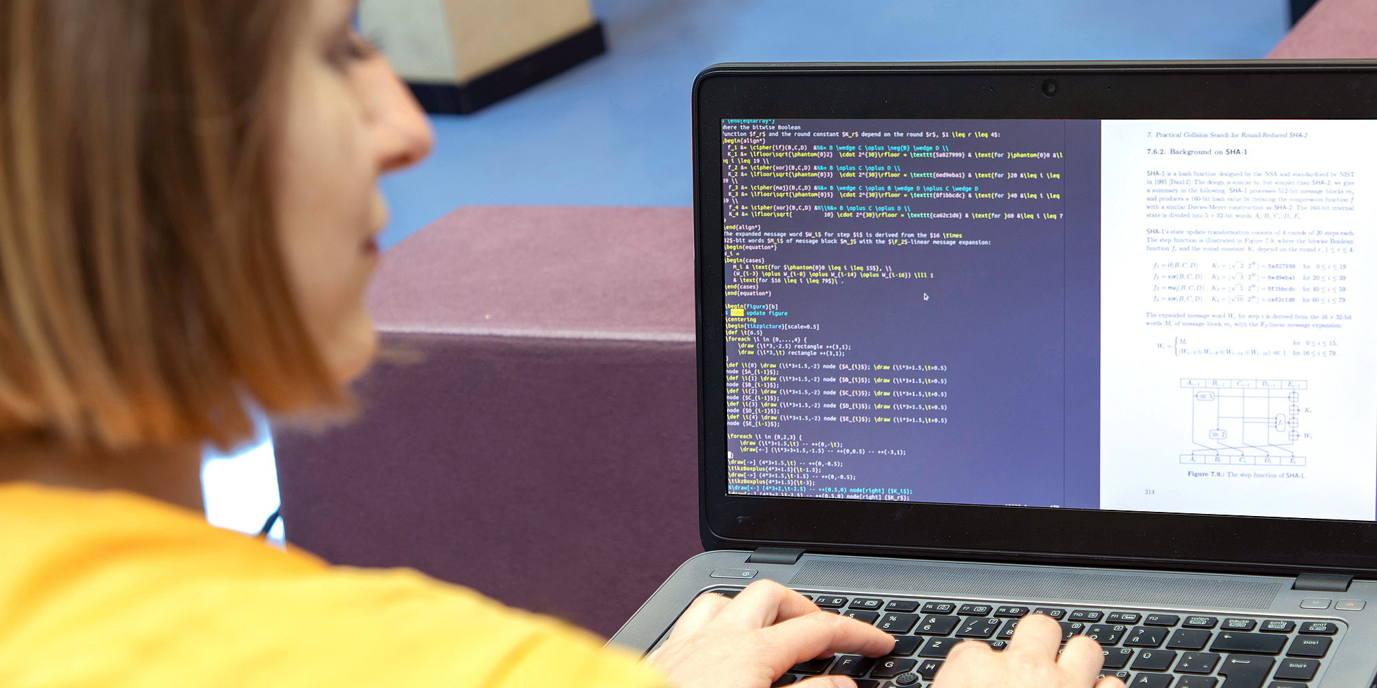 Student in front of a notebook screen with lines of code