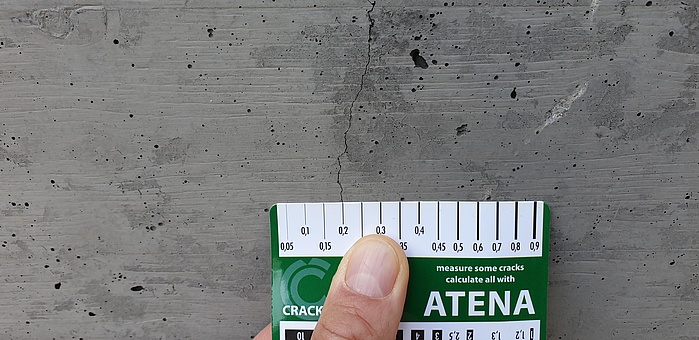 A concrete surface with several cracks.