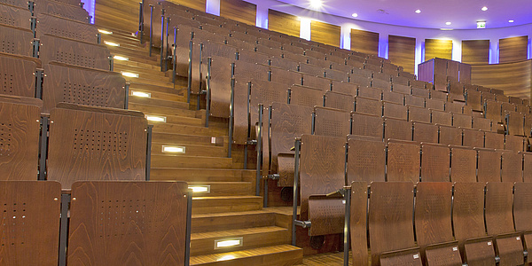 Empty seats in an auditorium.