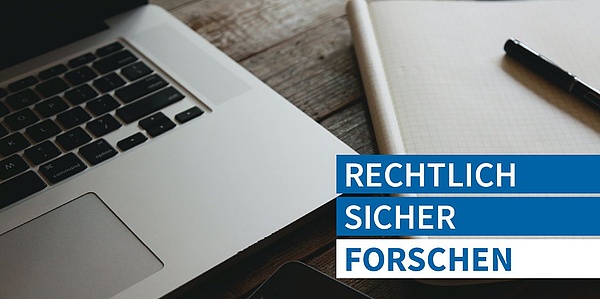 A notebook, next to it a text in German: Rechtlich sicher forschen.