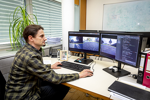 Man sitting in front of computer