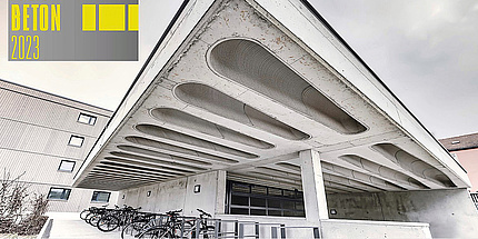Concrete garage roof with elongated recesses on the underside.