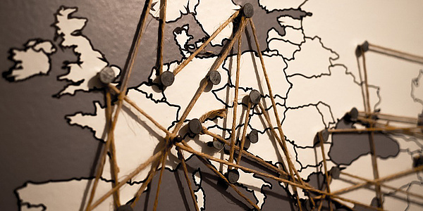 Map of Europe with pins and cords, Source: pixabay