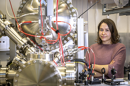 A woman in a physics laboratory