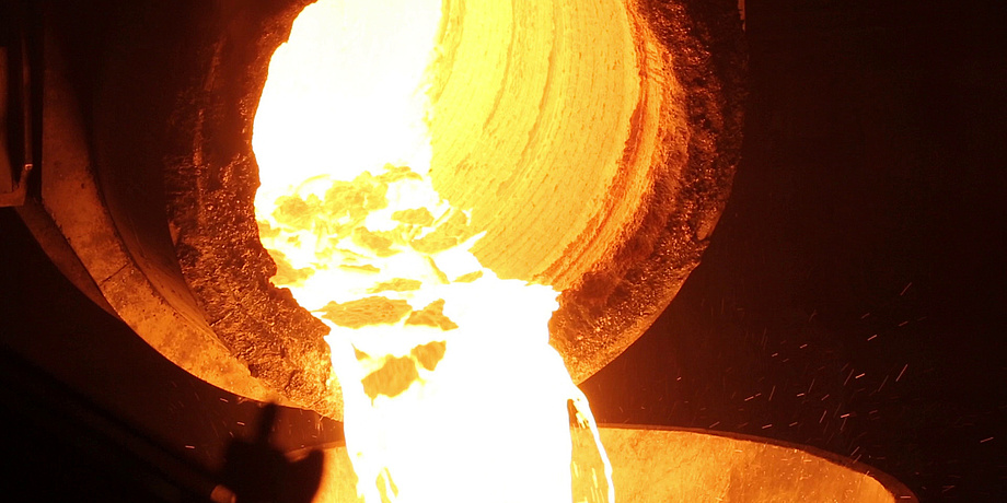 Liquid steel coming out of a furnace
