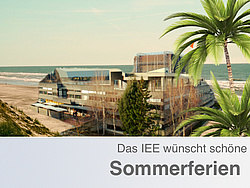 Photo montage shows building of Inffeldgasse 18 on the beach framed with palm trees.