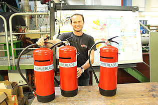 Martin Haubenhofer, head of our workshop, showing the sorrow boxes he made for the works council for academic personnel!