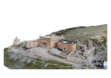 A bird's-eye view of an ensemble of brick temple buildings.