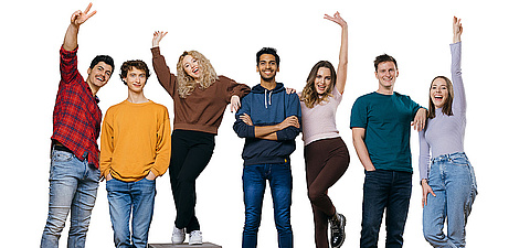 7 students of TU Graz laugh in a celebratory pose at the camera.
