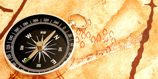 Compass on a map, Source: stockpics – Fotolia.com