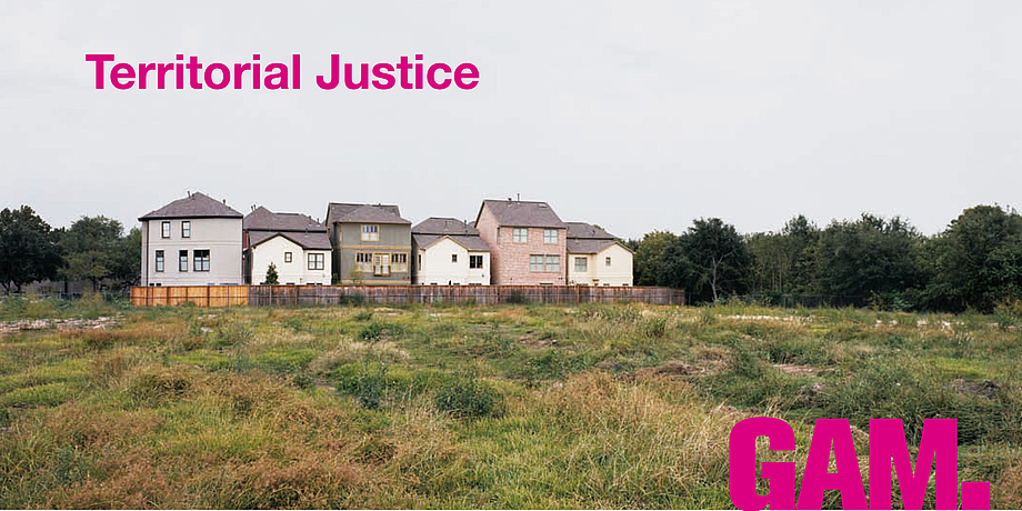 The front of six simple seeming suburban houses against a copse in the middle of a heathery meadow and surrounded by a shared wooden fence and reminiscent of a fort.