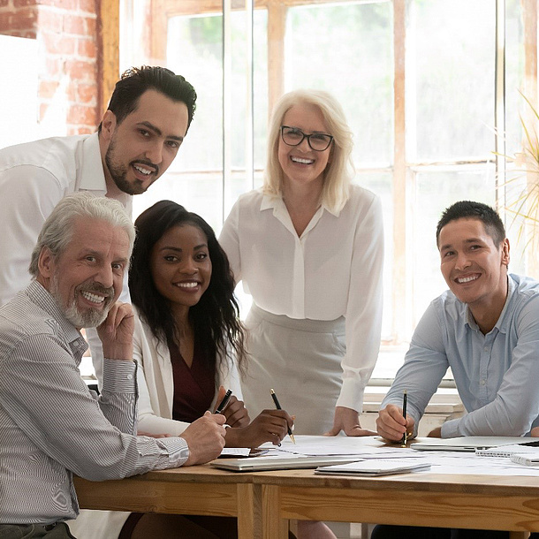 People at a table with papers