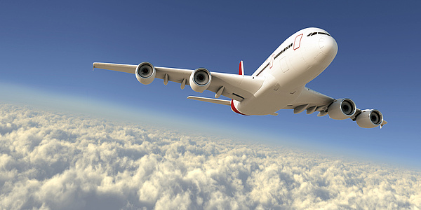 Airplane above the clouds. Source: Maksim Samasiuk – Fotolia.com