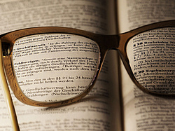 glasses on a legal text