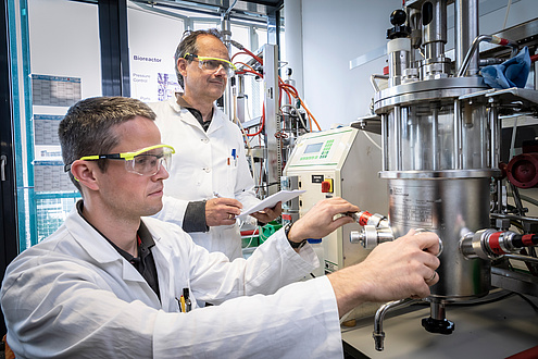 Researchers at work, laboratory equipment