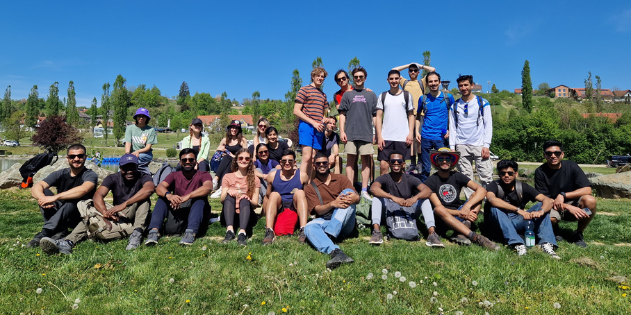 A group of young people on a meadow.