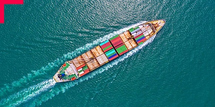 Container ship from above on the high seas