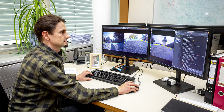 Man sitting in front of computer