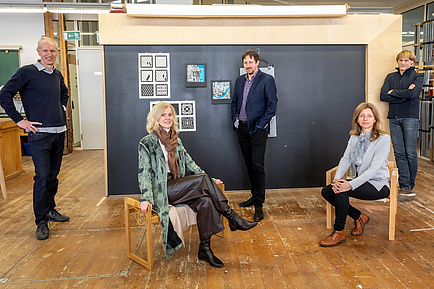 Five TU Graz employees in the furniture workshop