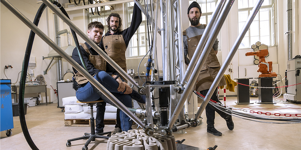 A photo of the printer and the team.