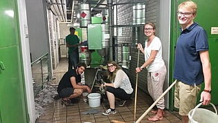 All-purpose education: Our PhD students fight the flooding of our institute after heavy rainfall