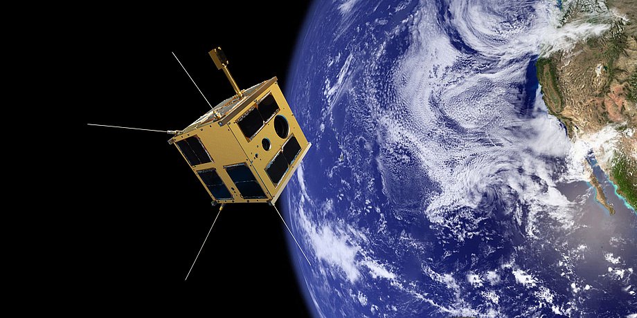 A rendered picture of a satellite above a section of the earth