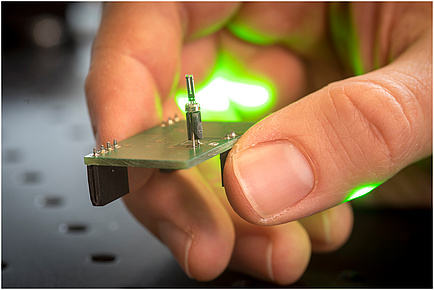 A laser focused tuning fork sensor in close-up