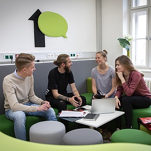 Students talking in a small group