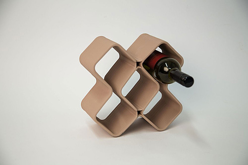 Cross-shaped wine rack made of ceramics