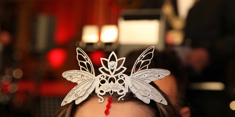 A butterfly-shaped crown.