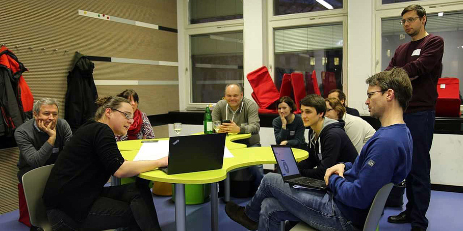 People working together at a table.