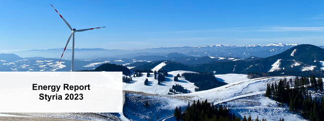 Snowy mountain with wind power plant.