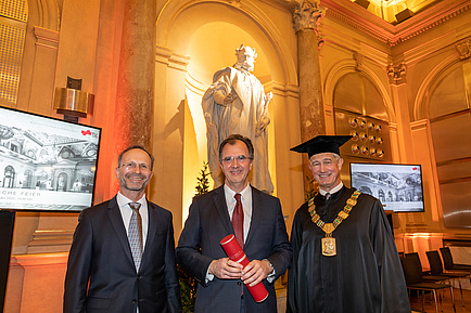 Three gentlemen in festive attire