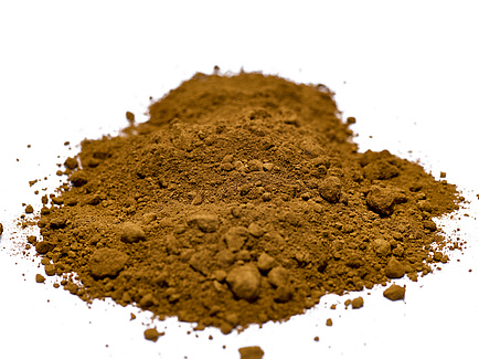 Fine brown powder lies in a pile.