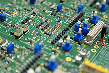 Detailed view of electronic components on a printed circuit board.