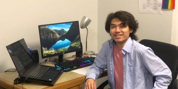 student, sitting in front of the computer, studying, e-learning 