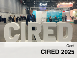 Benjamin behind the letters CIRED at the conference.