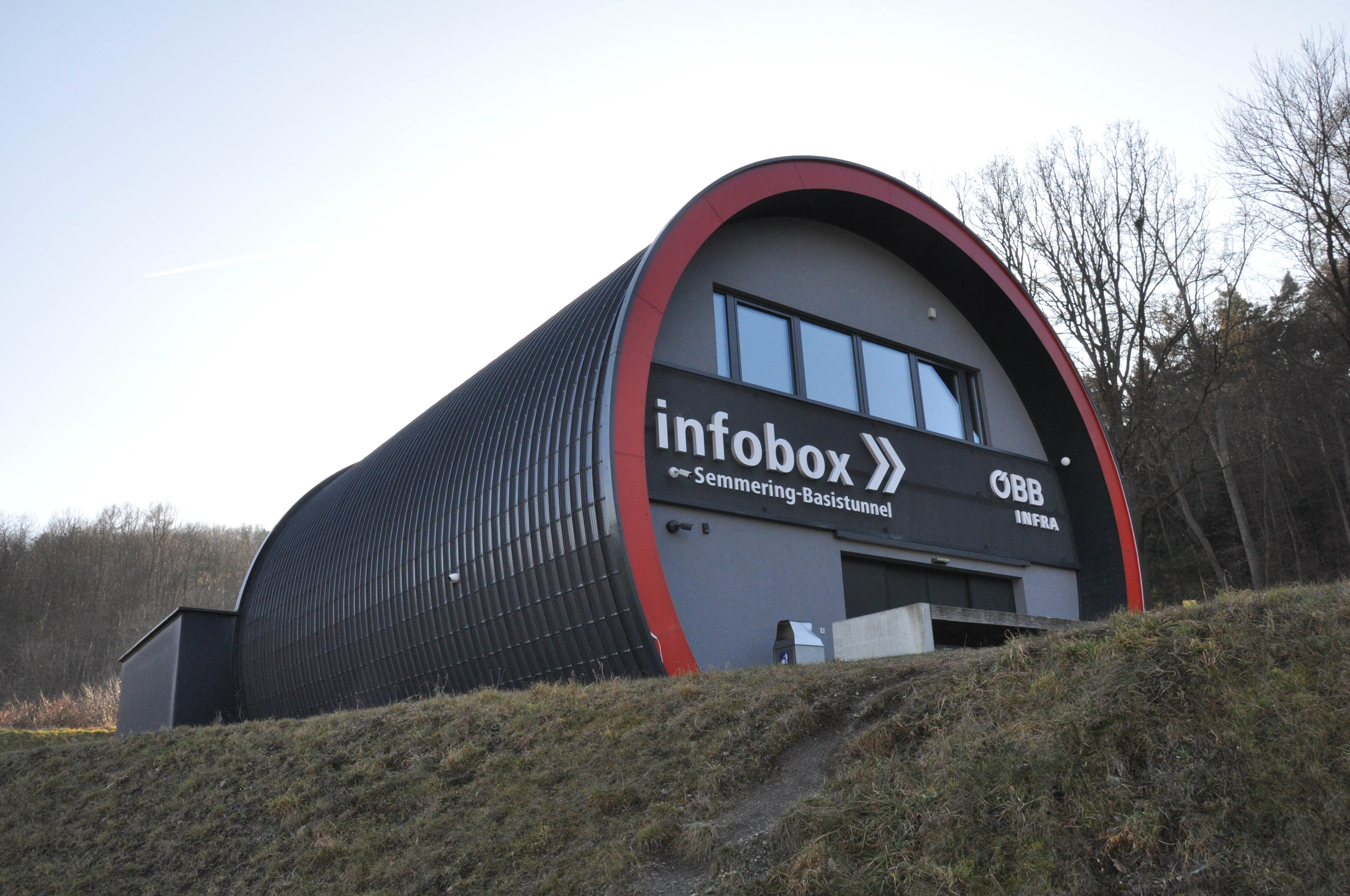 A building in the shape of a tunnel tube labelled ‘Infobox’.